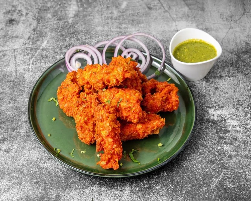 Tandoori chicken with saffron rice and mint chutney at Spicy Mahal in northeast Edmonton